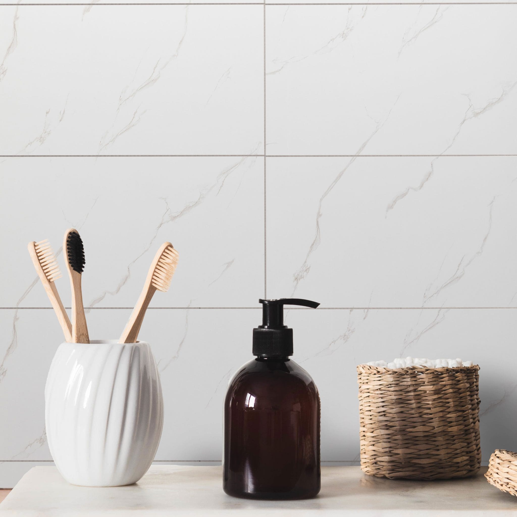 White bath background front view with cosmetic bottle and bath accessories